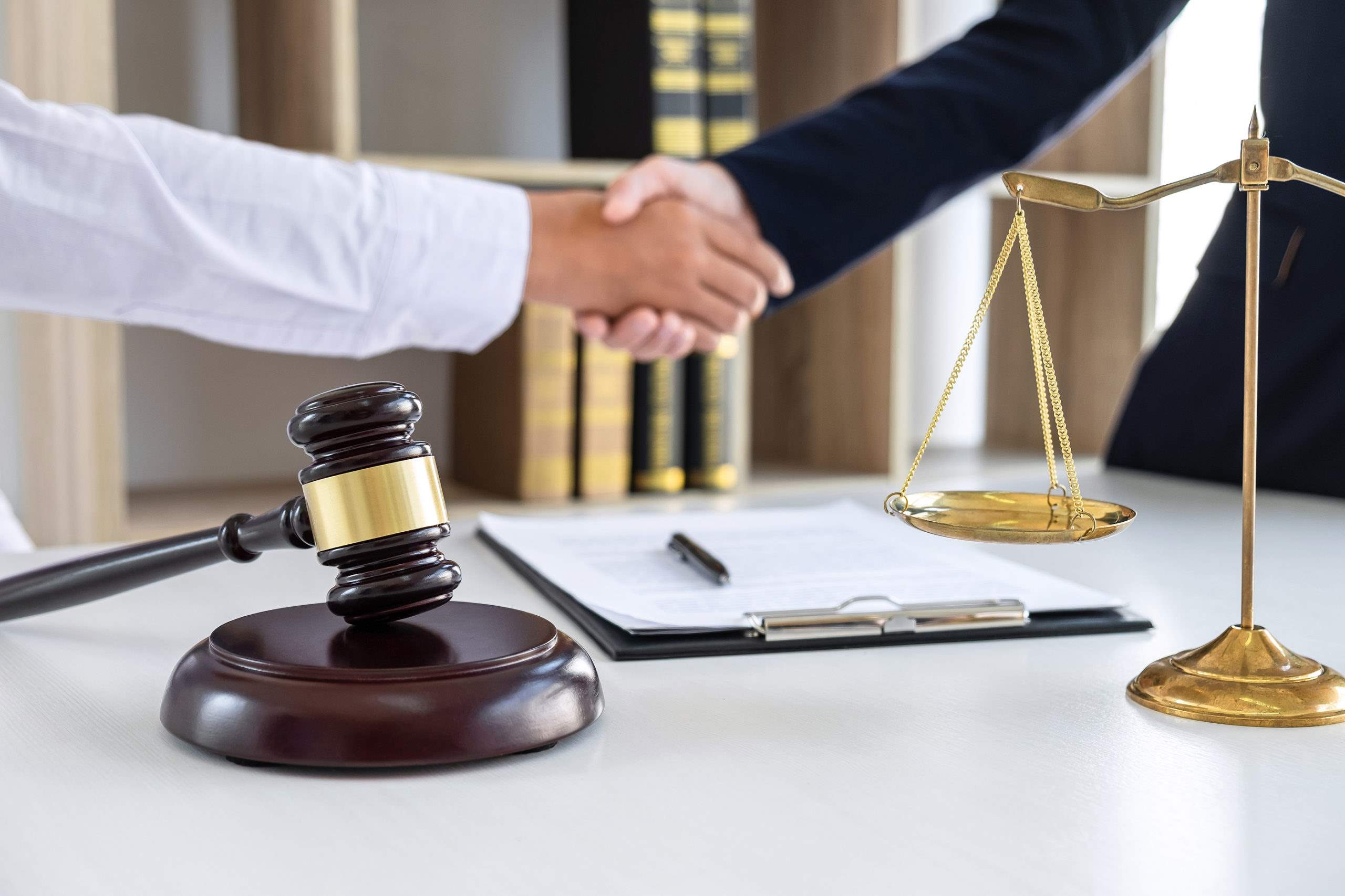 image of legal contract being signed